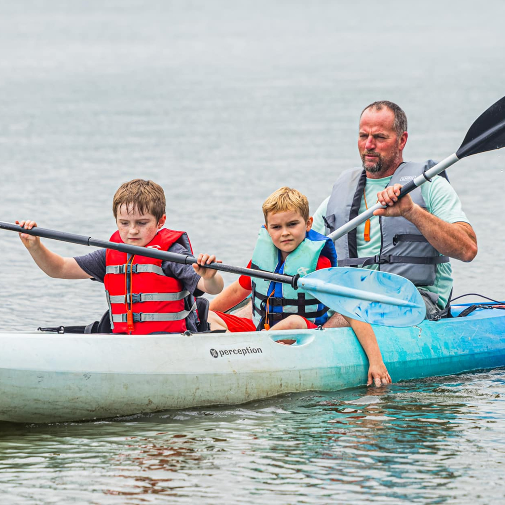 Family kayaking on Lake Decatur
